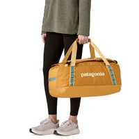 Bolso Black Hole® Duffel 40L - Pufferfish Gold