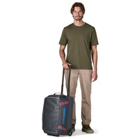 Bolso con Ruedas Black Hole® Wheeled Duffel 40L - Smolder Blue & Amanita Red