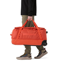 Bolso con Ruedas Black Hole® Wheeled Duffel 70L - Pollinator Orange